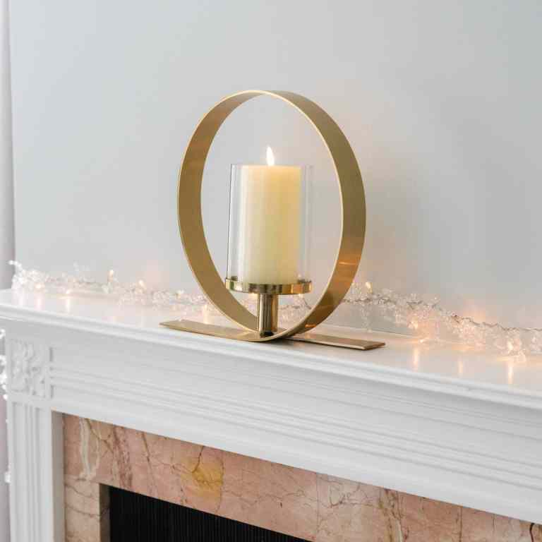 Elegant gold loop candle holder, a perfect homeware accessory for modern interiors.