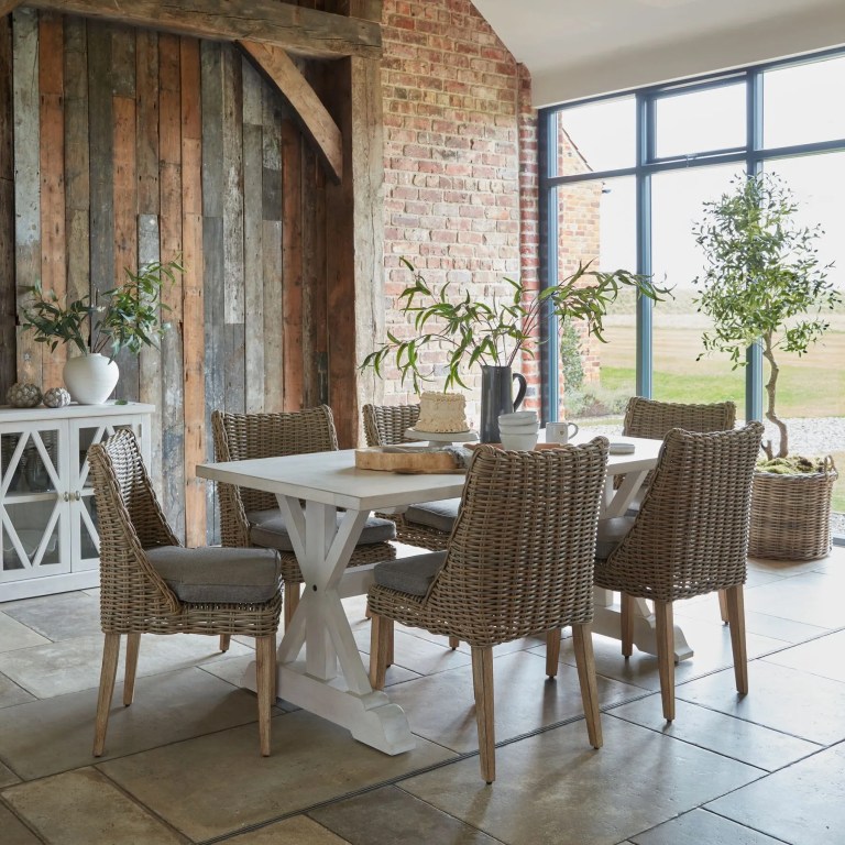 Elegant artificial plant in a modern dining area, ideal for stylish home decor.